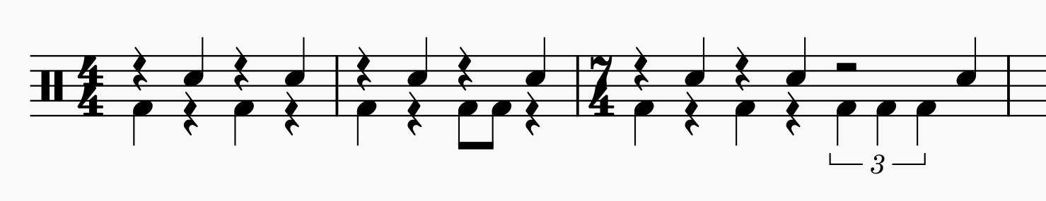 two measures of music notation in 4/4 followed by a measure in 7/4. the 7/4 measure contains a quarter note tuplet on the kick drum